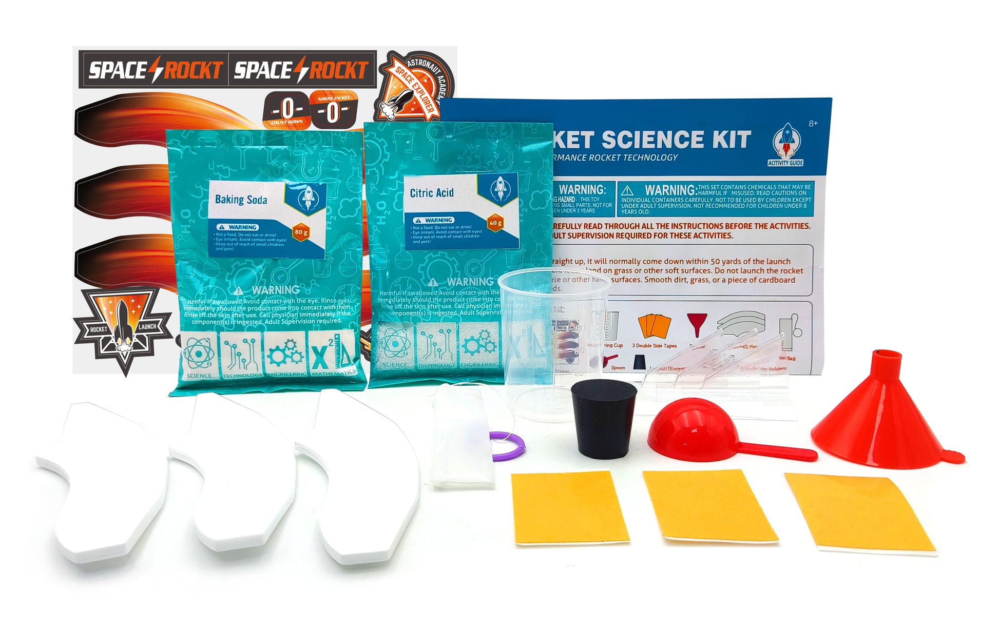 Kit contents include instructions, rocket fins with decals, chemicals, and lab tools. 